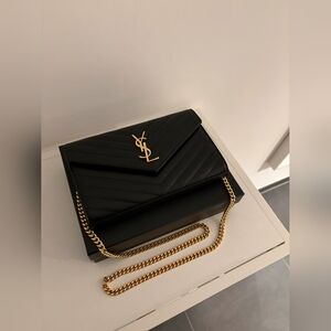 Yves Saint Laurent Cassandre Chain Wallet In Lambskin
